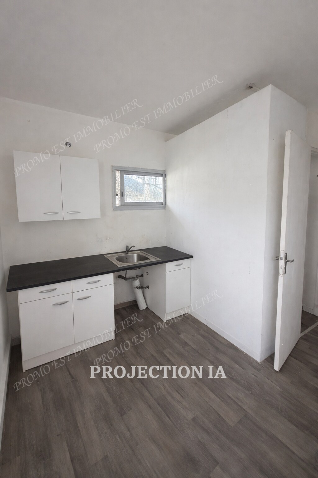 Accueil — Agence immobilière PROMO EST IMMOBILIER À louer – Local commercial vide de 32 m² – Saint-André — vue 2
